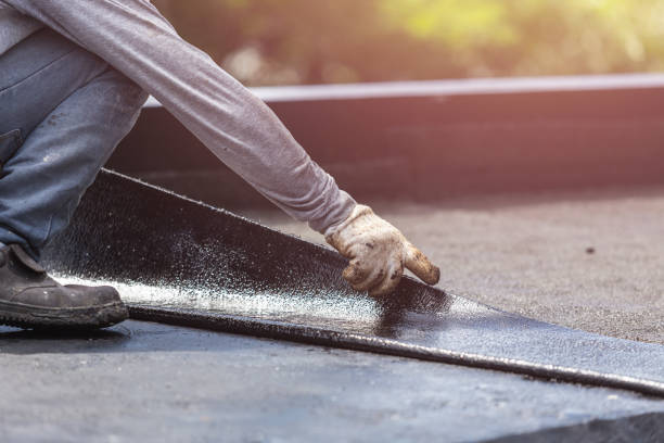 Professional Basement Waterproofing technician working in Levittown, PA